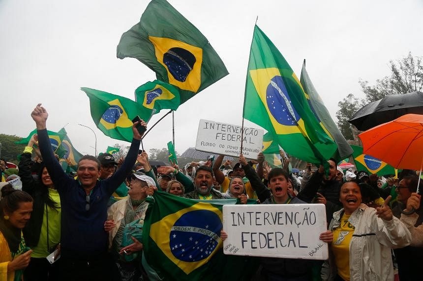 Brazil's president refuses to admit defeat, supporters call for military intervention